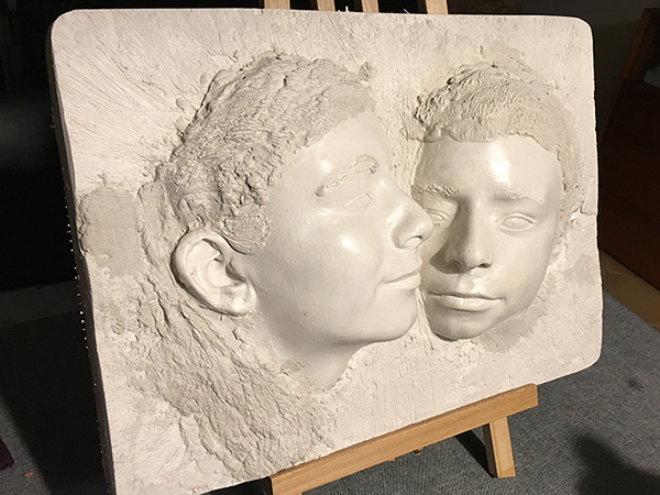 IZA – Isabelle Ardevol - moulages du visage de deux adolescents en resine acrylique. Une autre façon d'envisager le portrait. Atelier de sculpture a Lausanne.