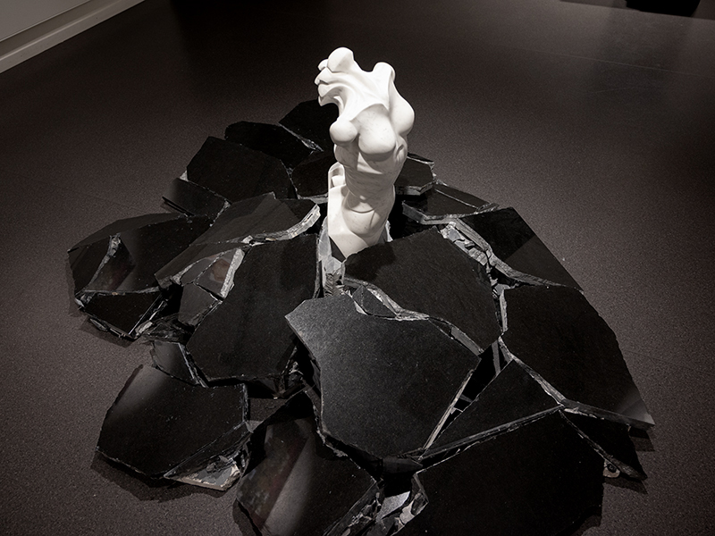 IZA, Isabelle Ardevol, woman contemporary artist, sculptress, art, Strange Mermaid, sculpture carved in recycled blocks of white carrara marble and black granite. It's part of the In Chaotic lands serie, inspired y the societal changes due to global warming
